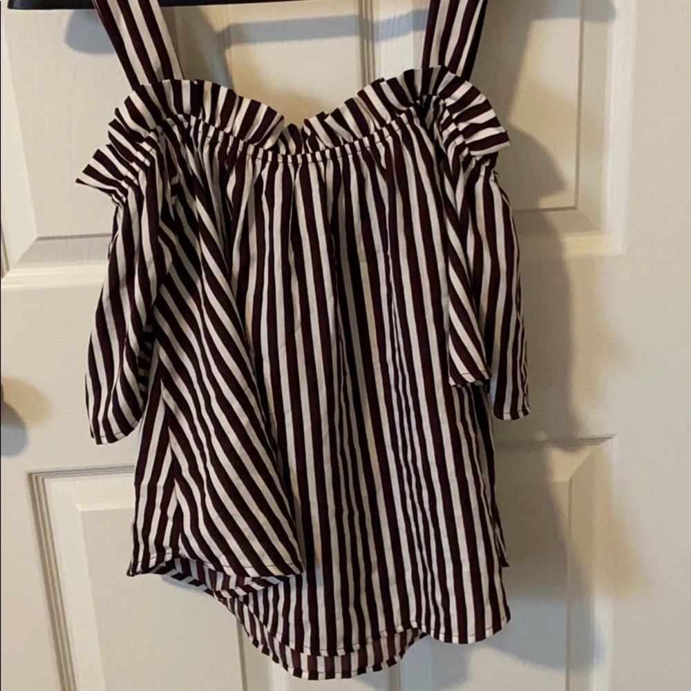 Cut off shoulder blouse